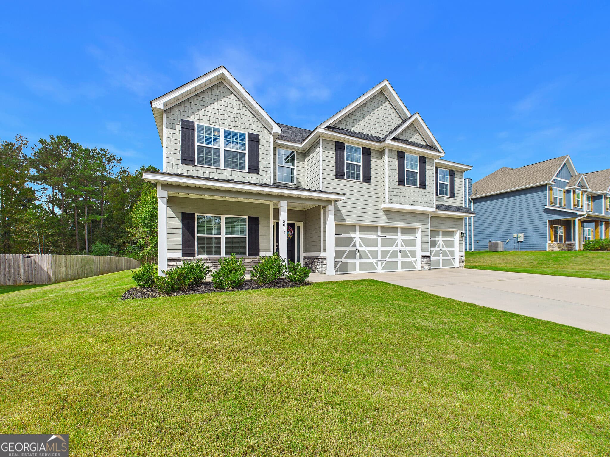 5 bedroom, 3 bathroom, 3,158 sq ft single family residence for sale at 5017 Tybalt Run, Forsyth, GA 31029 — photo 4
