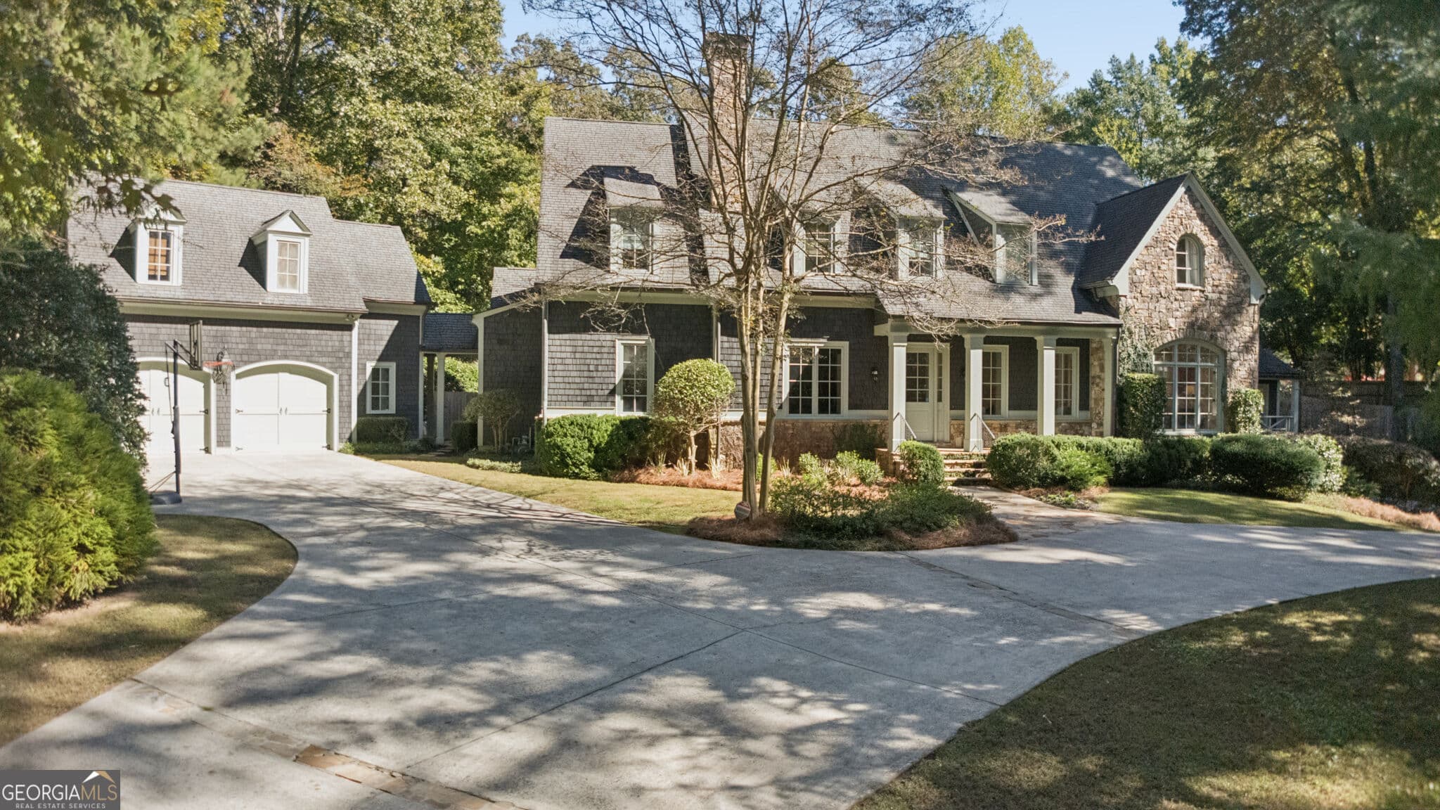 6 bedroom, 6.5 bathroom, 5,282 sq ft single family residence for sale at 4065 Beechwood Drive, Atlanta, GA 30327 — photo 2