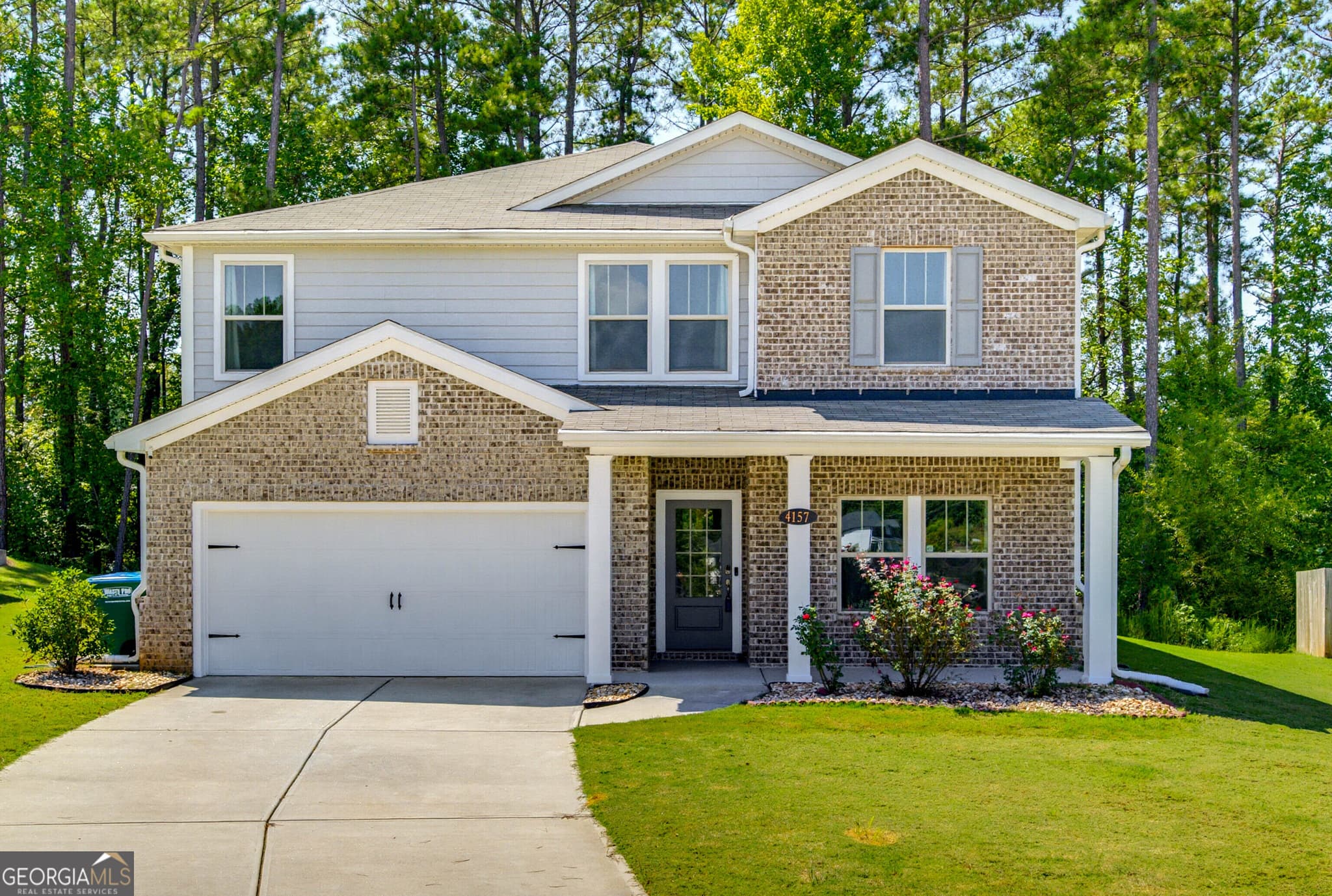 5 bedroom, 3 bathroom, 2,742 sq ft single family residence for sale at 4157 Bethany Manor Drive, Snellville, GA 30039 — photo 1 of 44