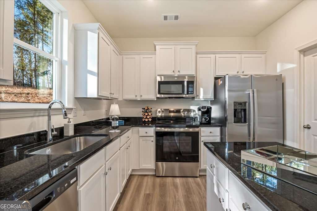 3 bedroom, 2.5 bathroom townhouse for sale at 1510 Aralynn Court 30, Conyers, GA 30013 — photo 9
