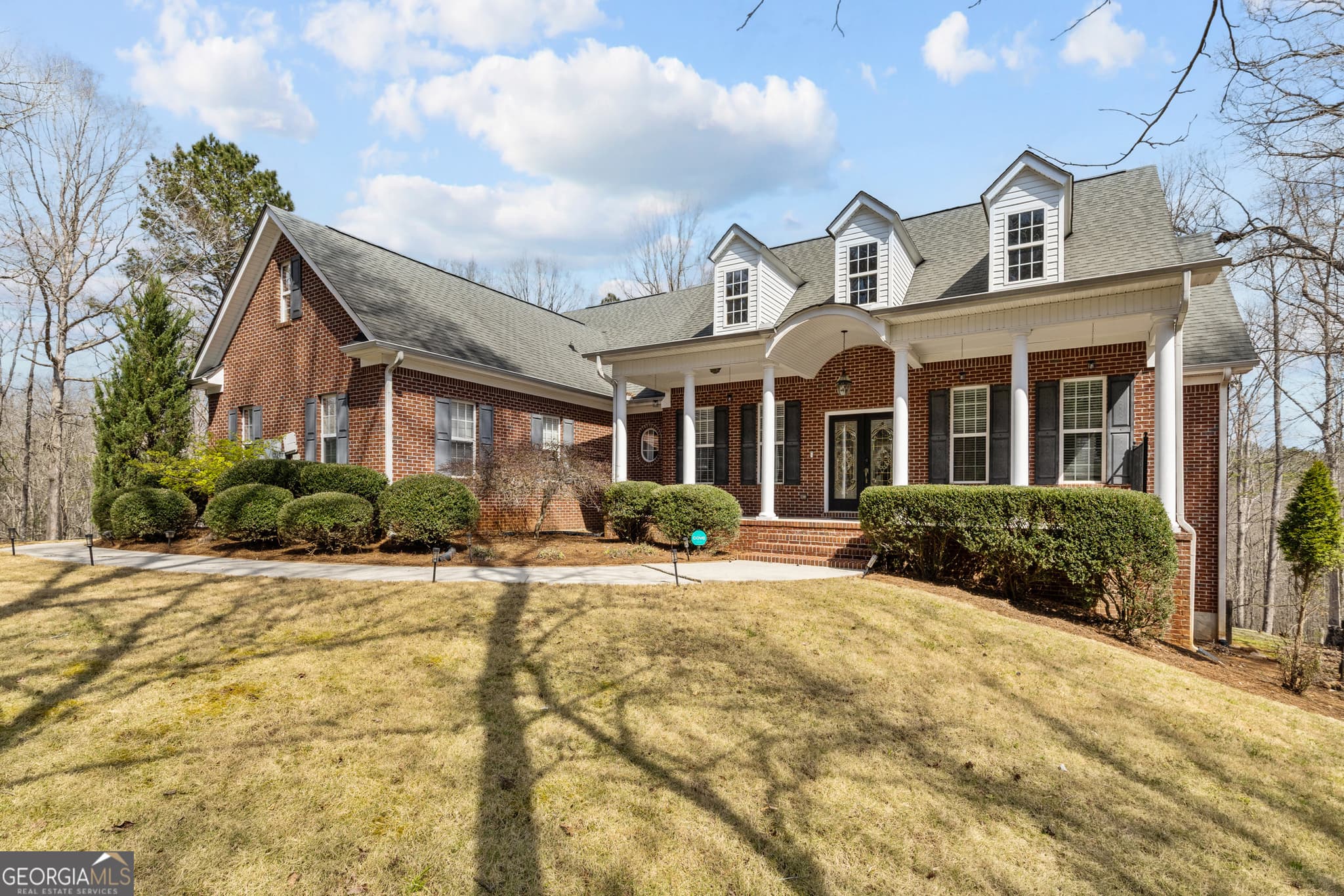 6 bedroom, 4.5 bathroom, 4,986 sq ft single family residence for sale at 9810 Walnut Grove Trail, Villa Rica, GA 30180 — photo 2