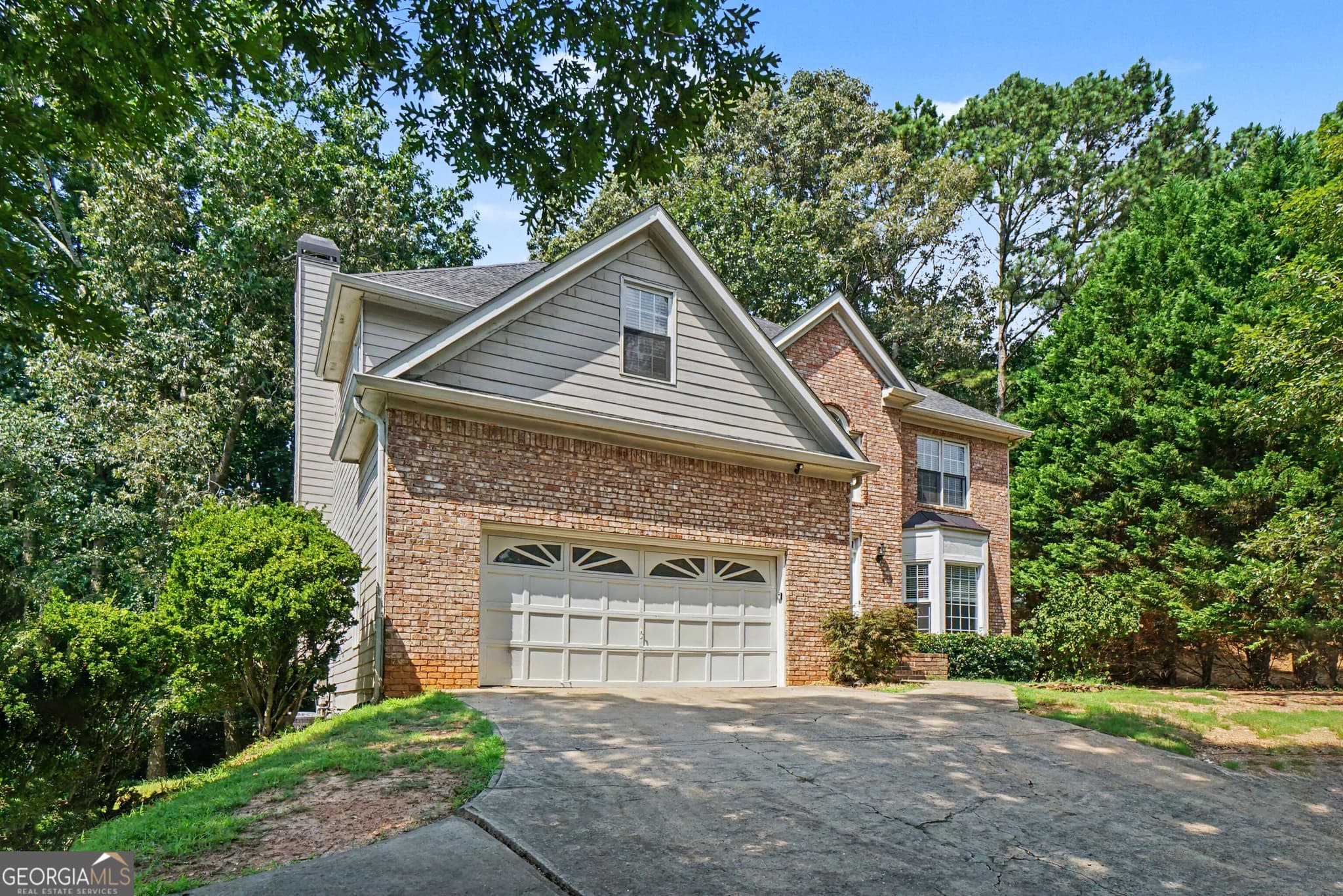 5 bedroom, 3.5 bathroom, 4,018 sq ft single family residence for sale at 213 Powers Court, Woodstock, GA 30189 — photo 2
