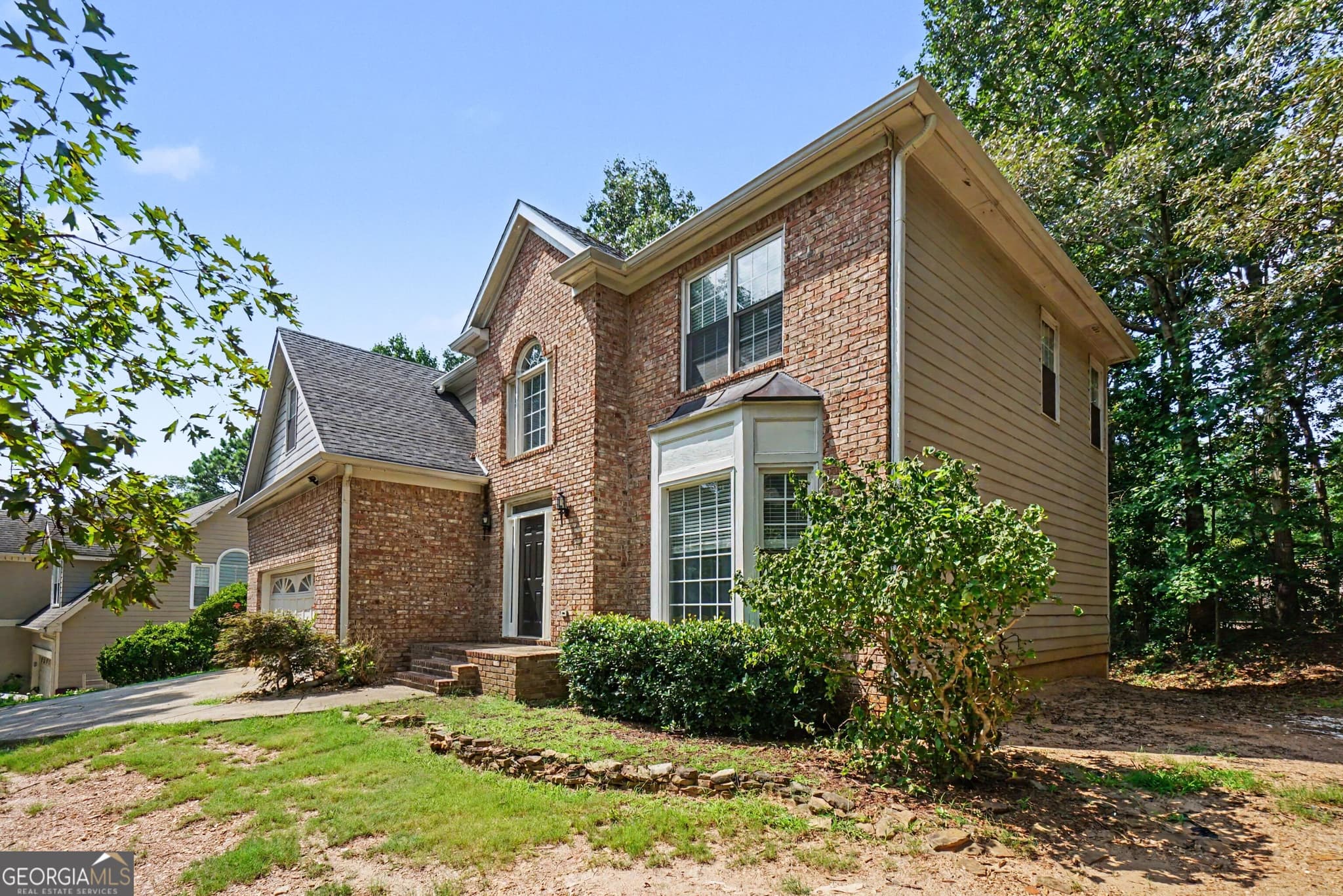 5 bedroom, 3.5 bathroom, 4,018 sq ft single family residence for sale at 213 Powers Court, Woodstock, GA 30189 — photo 3