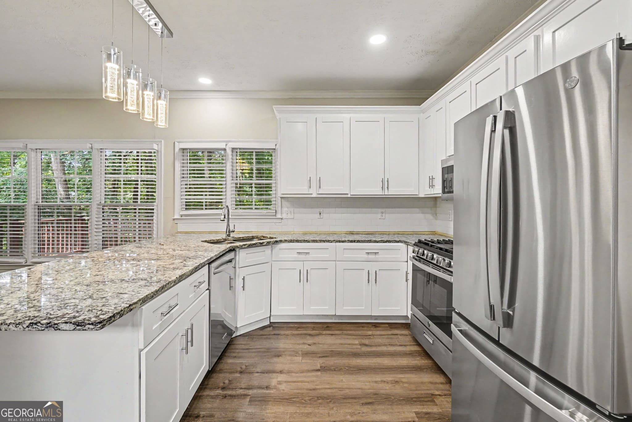 5 bedroom, 3.5 bathroom, 4,018 sq ft single family residence for sale at 213 Powers Court, Woodstock, GA 30189 — photo 9