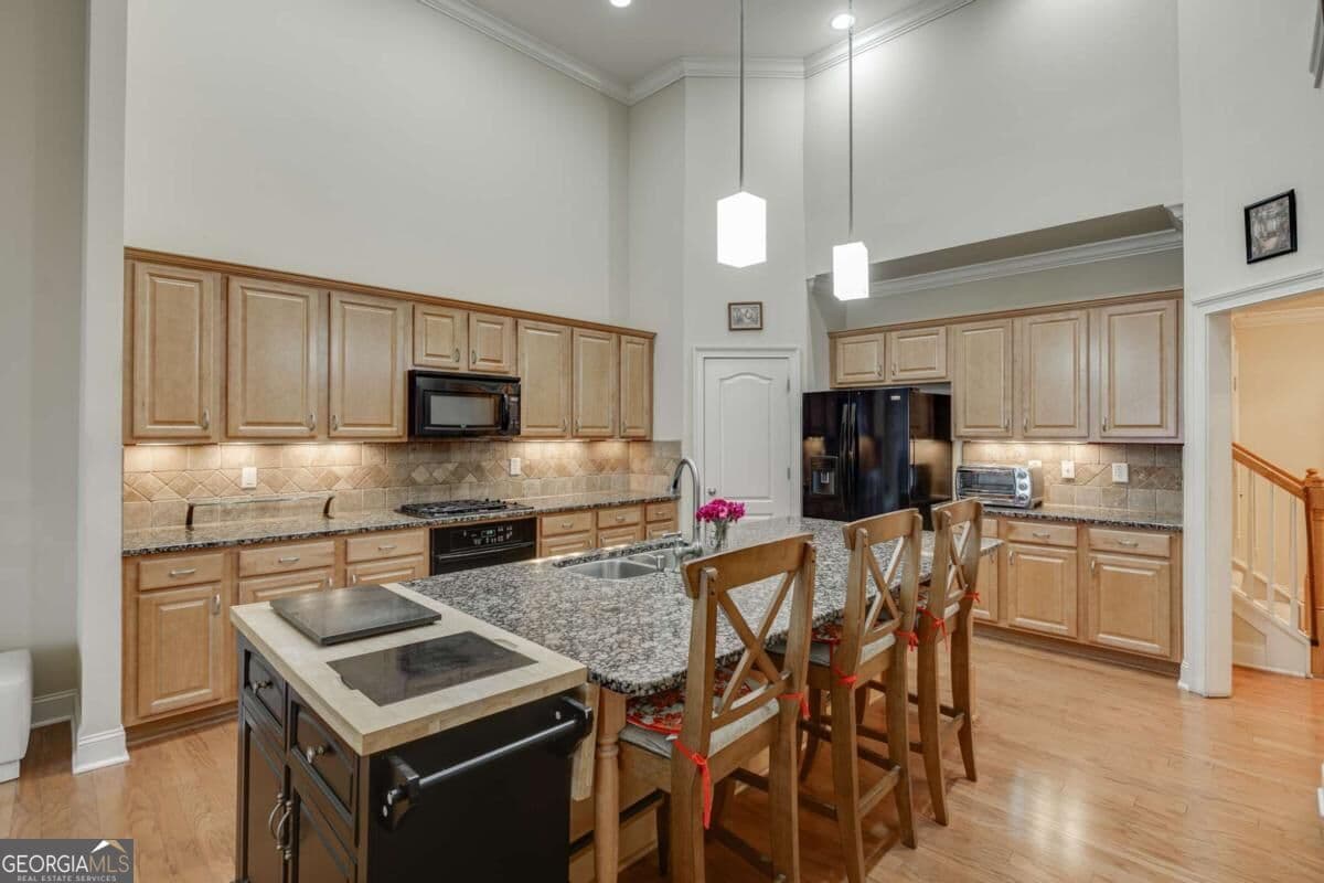 5 bedroom, 4 bathroom, 5,215 sq ft single family residence for sale at 1560 Woodall Trace, Alpharetta, GA 30004 — photo 2