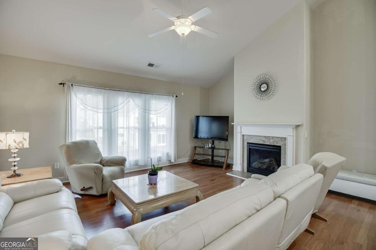 5 bedroom, 4 bathroom, 5,215 sq ft single family residence for sale at 1560 Woodall Trace, Alpharetta, GA 30004 — photo 4