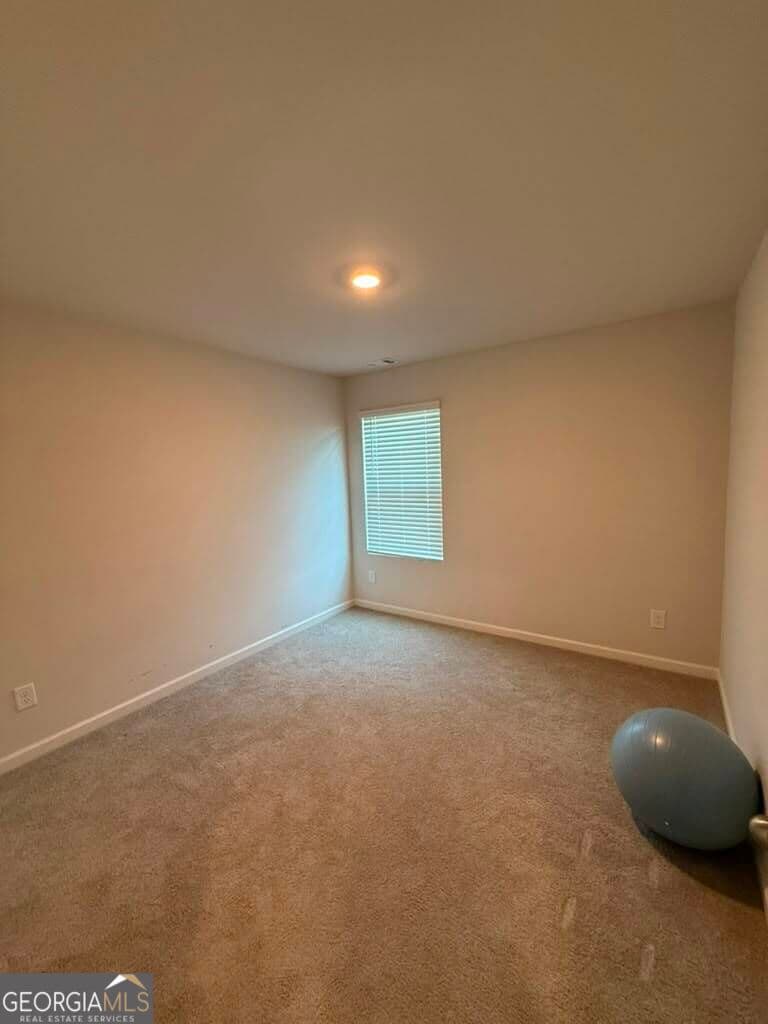 5 bedroom, 4 bathroom, 3,480 sq ft single family residence for sale at 7481 Hawk Tail Way, Fairburn, GA 30213 — photo 7