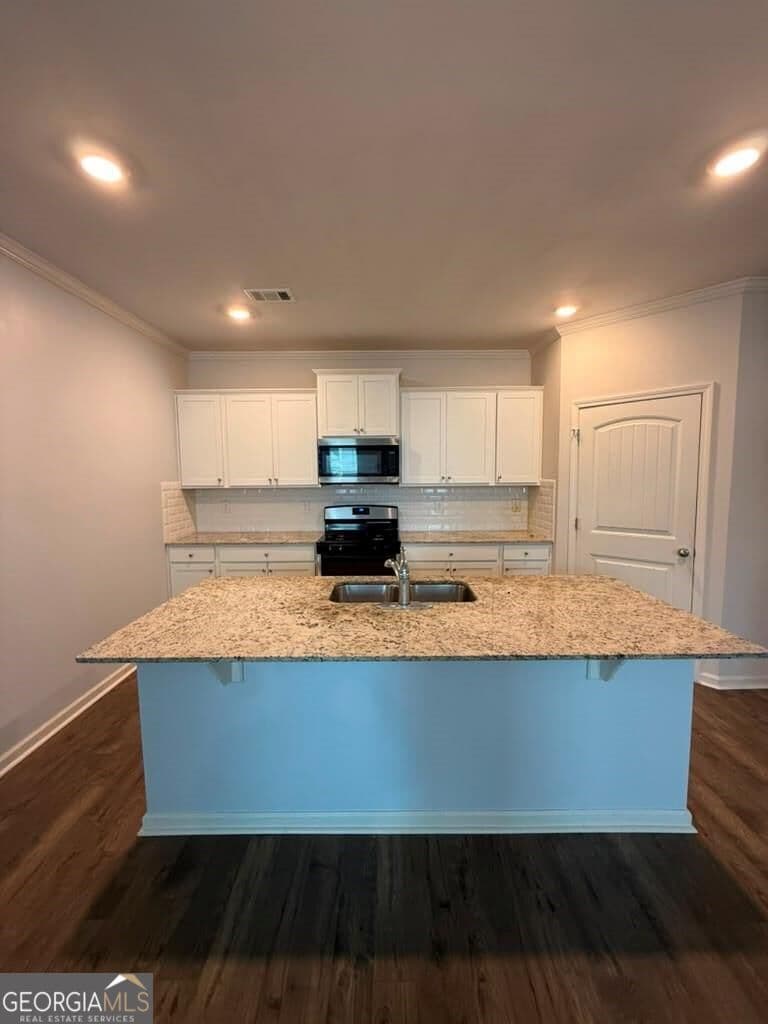 5 bedroom, 4 bathroom, 3,480 sq ft single family residence for sale at 7481 Hawk Tail Way, Fairburn, GA 30213 — photo 3