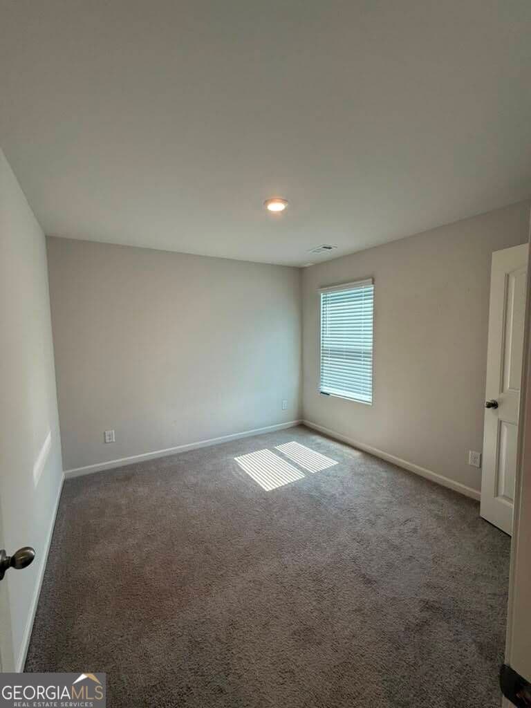 5 bedroom, 4 bathroom, 3,480 sq ft single family residence for sale at 7481 Hawk Tail Way, Fairburn, GA 30213 — photo 9