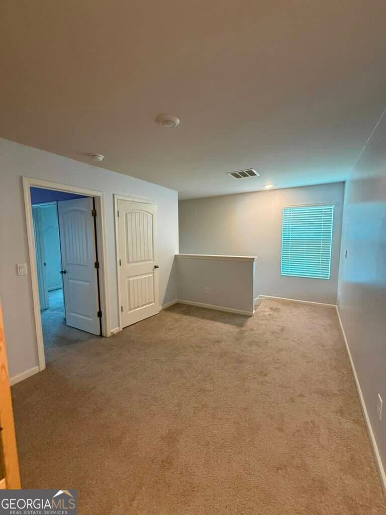 5 bedroom, 4 bathroom, 3,480 sq ft single family residence for sale at 7481 Hawk Tail Way, Fairburn, GA 30213 — photo 10