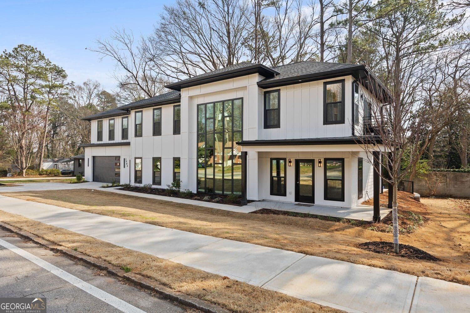 6 bedroom, 5 bathroom, 3,104 sq ft single family residence for sale at 1985 McAfee Road, Decatur, GA 30032 — photo 2