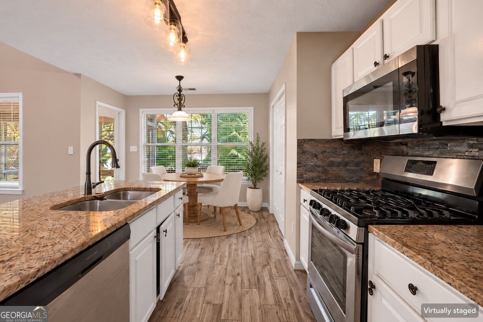 4 bedroom, 2.5 bathroom, 2,585 sq ft single family residence for sale at 3952 Lullwater Main, Kennesaw, GA 30144 — photo 3