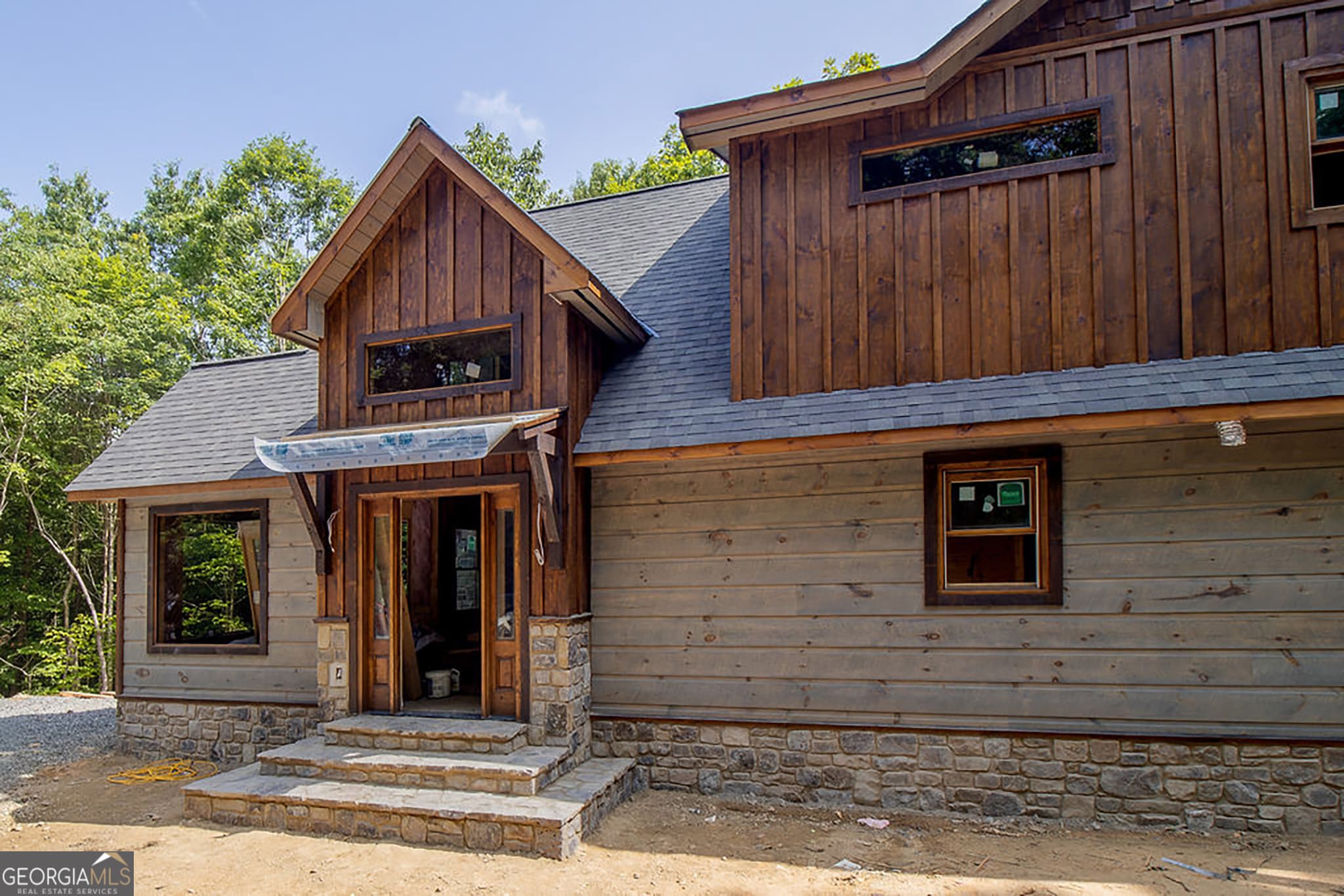 3 bedroom, 3 bathroom, 2,820 sq ft cabin,single family residence for sale at 79 Star Creek Court, Morganton, GA 30560 — photo 2