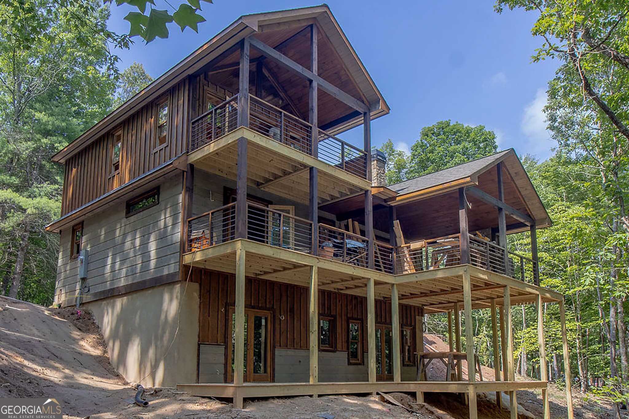 3 bedroom, 3 bathroom, 2,820 sq ft cabin,single family residence for sale at 79 Star Creek Court, Morganton, GA 30560 — photo 3