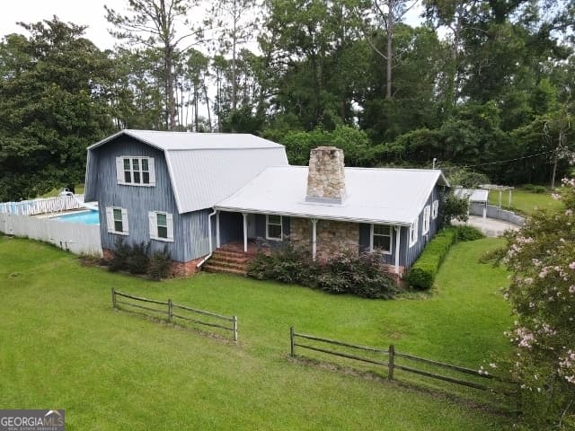 4 bedroom, 2.5 bathroom, 2,882 sq ft single family residence for sale at 817 Golf Drive, Swainsboro, GA 30401 — photo 2