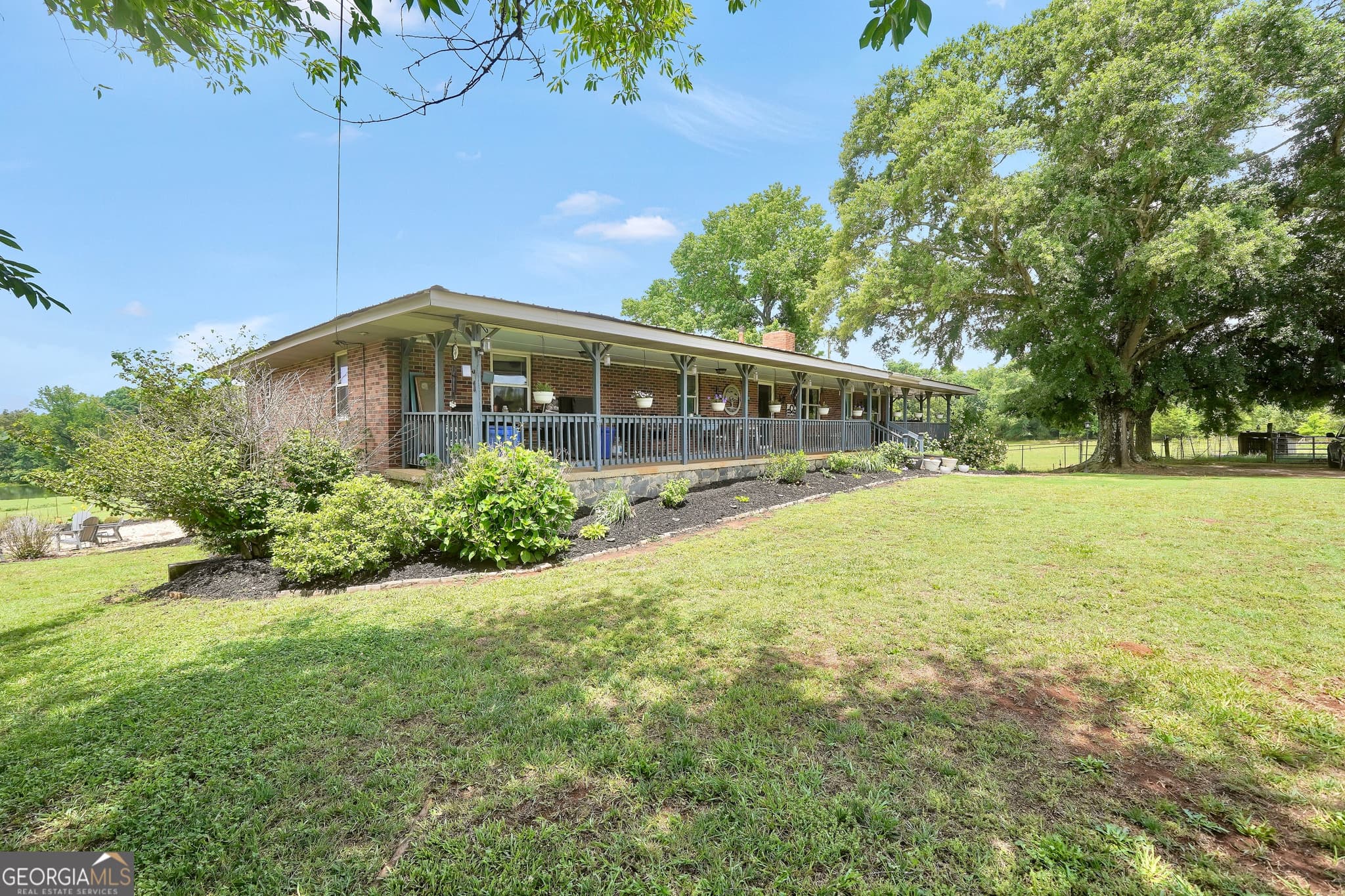 5 bedroom, 3.5 bathroom, 2,310 sq ft single family residence for sale at 876 Simpson Mill Road, Locust Grove, GA 30248 — photo 2