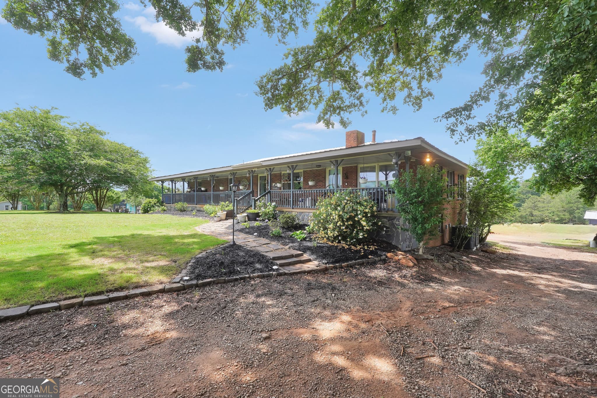 5 bedroom, 3.5 bathroom, 2,310 sq ft single family residence for sale at 876 Simpson Mill Road, Locust Grove, GA 30248 — photo 1 of 47