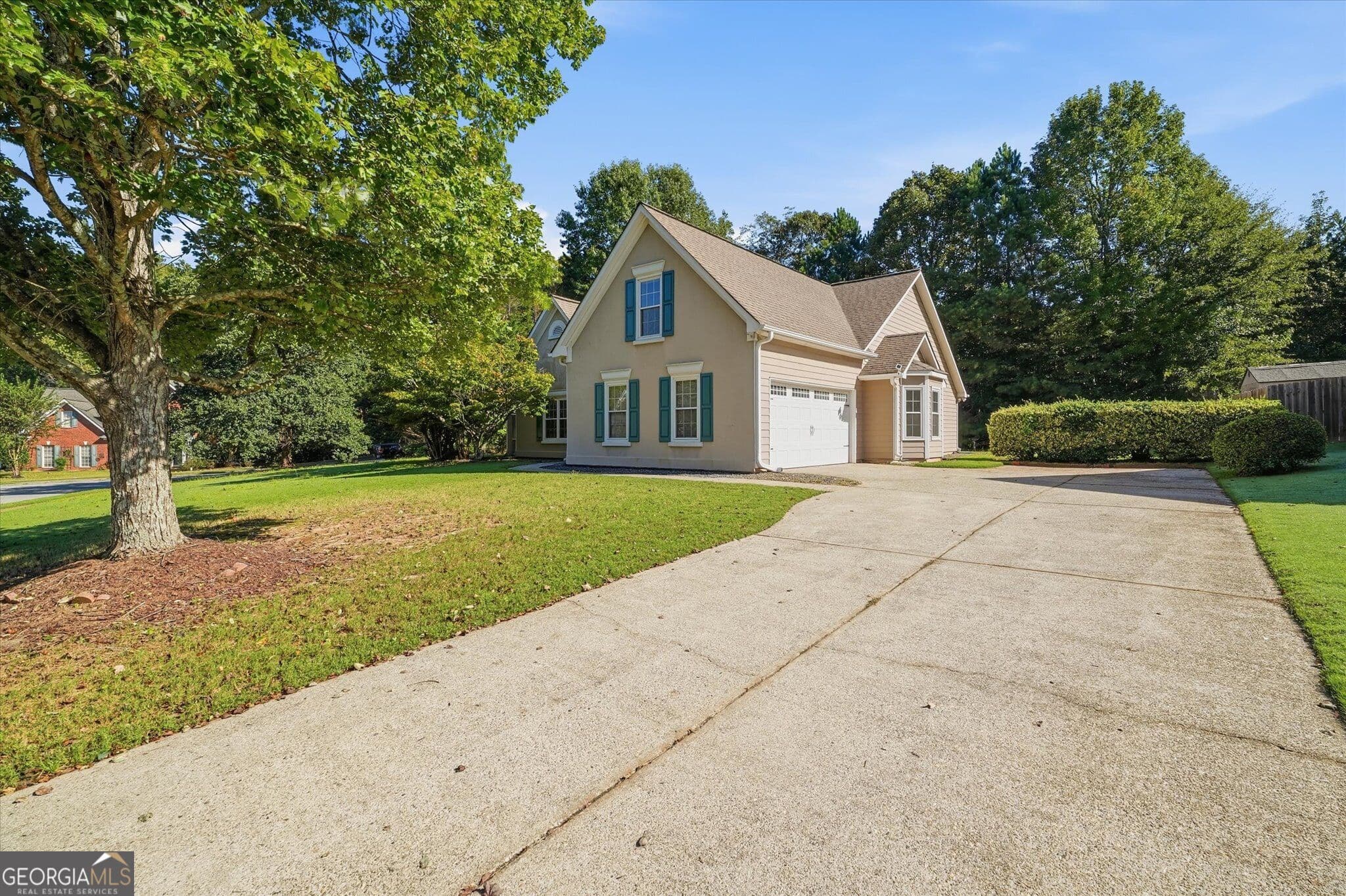 4 bedroom, 3 bathroom single family residence for sale at 4225 Ruby Forest Boulevard, Suwanee, GA 30024 — photo 2