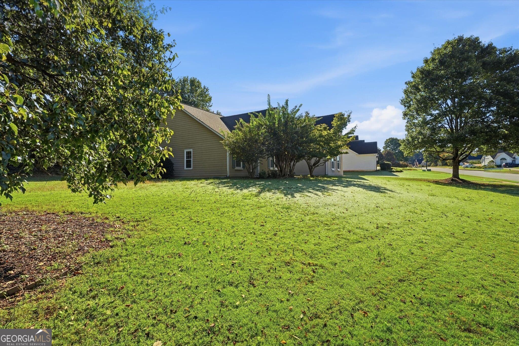 4 bedroom, 3 bathroom single family residence for sale at 4225 Ruby Forest Boulevard, Suwanee, GA 30024 — photo 3