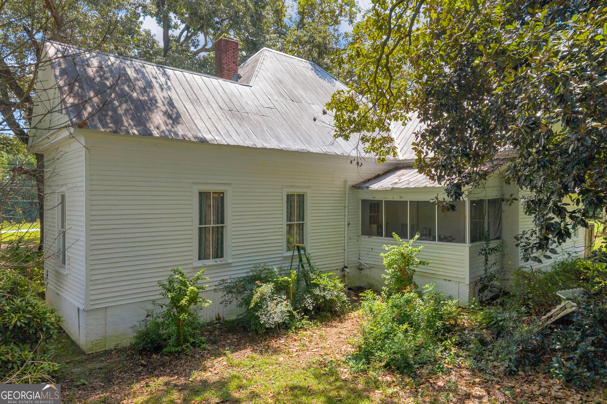 3 bedroom, 1 bathroom, 1,975 sq ft single family residence for sale at 1404 W Main Street, Bowersville, GA 30516 — photo 7