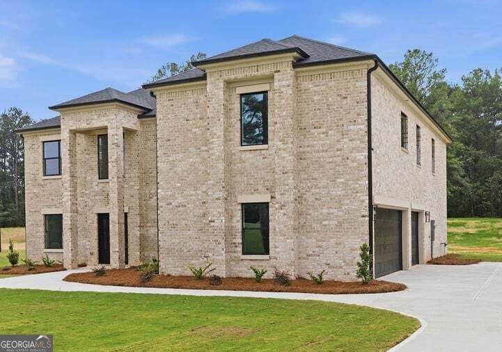 5 bedroom, 4 bathroom, 3,600 sq ft single family residence for sale at 1689 W Hightower Trail, Conyers, GA 30012 — photo 2