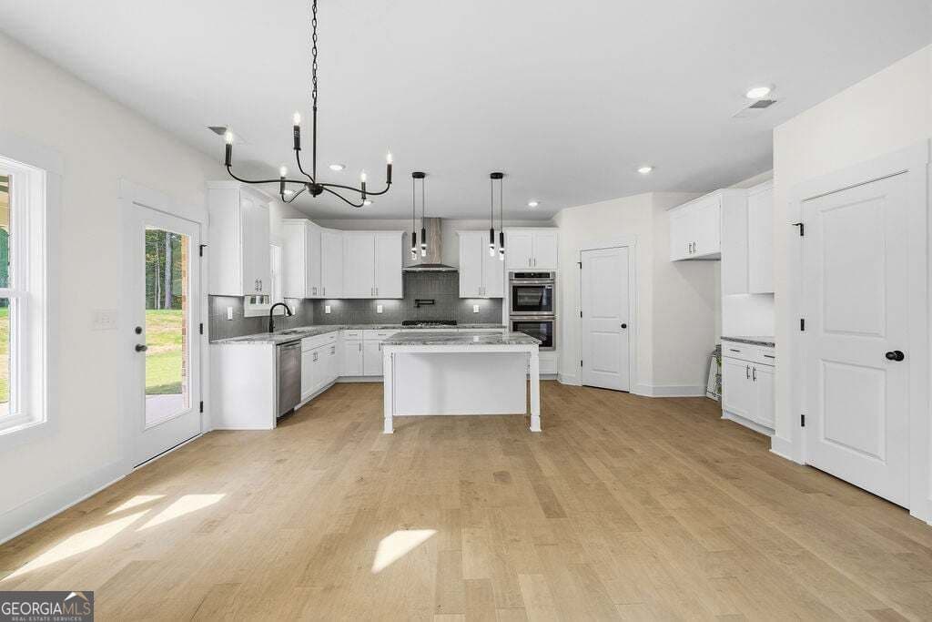 5 bedroom, 4 bathroom, 3,600 sq ft single family residence for sale at 1689 W Hightower Trail, Conyers, GA 30012 — photo 9