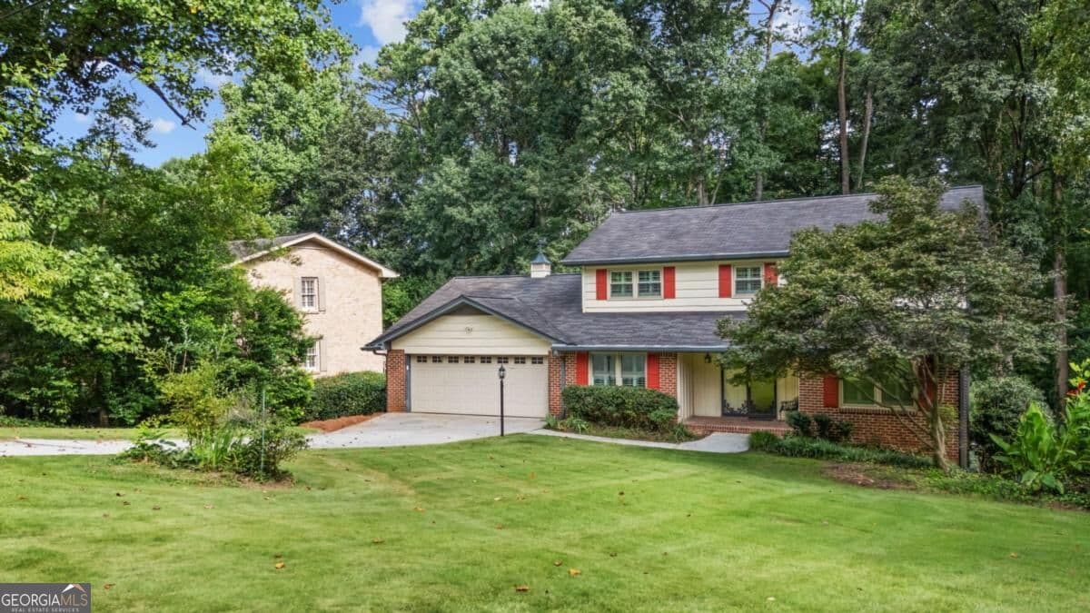 4 bedroom, 3.5 bathroom, 3,802 sq ft single family residence for sale at 2679 Regency Drive, Tucker, GA 30084 — photo 2