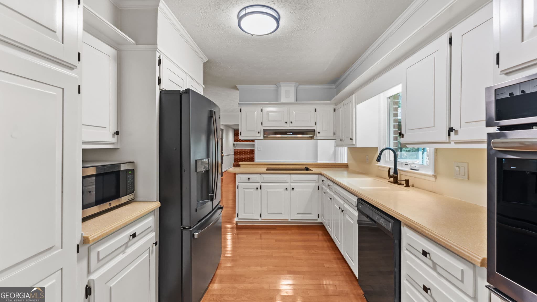 4 bedroom, 3.5 bathroom, 3,802 sq ft single family residence for sale at 2679 Regency Drive, Tucker, GA 30084 — photo 6