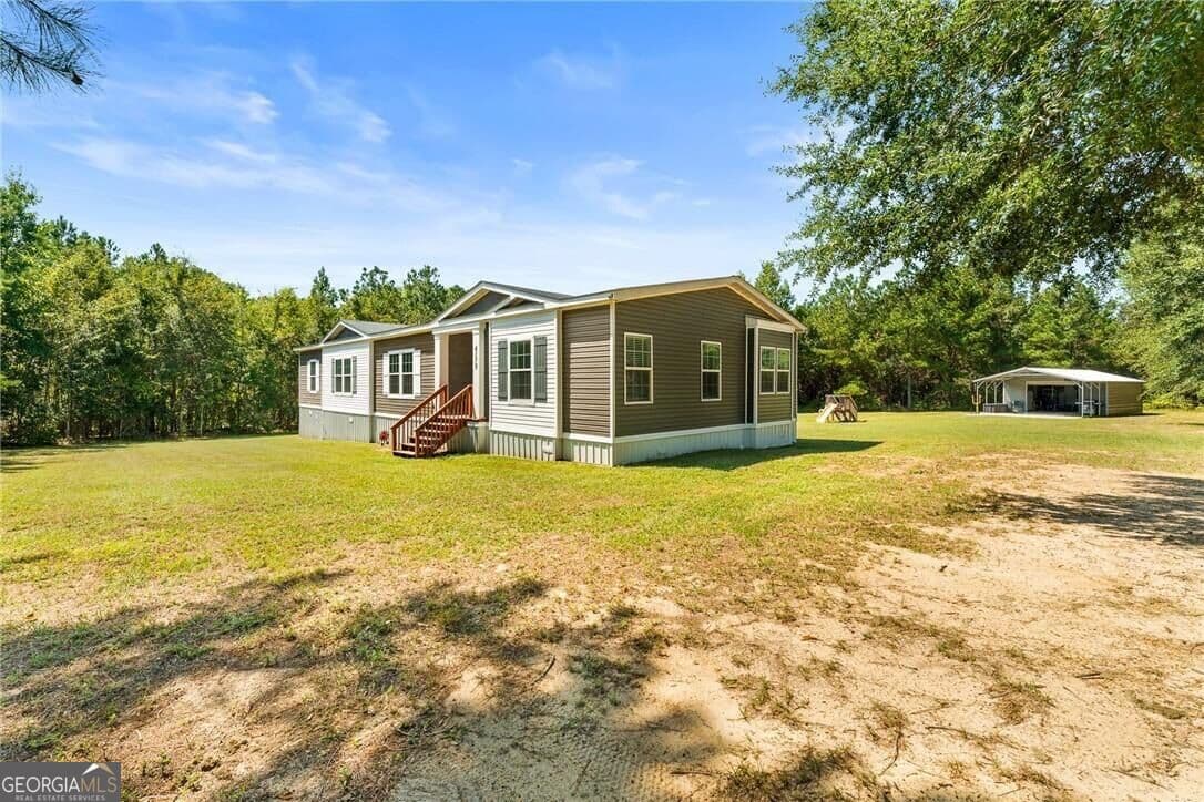 4 bedroom, 2.5 bathroom, 2,263 sq ft manufactured home,single family residence for sale at 4179 Nevils Groveland Road, Pembroke, GA 31321 — photo 3