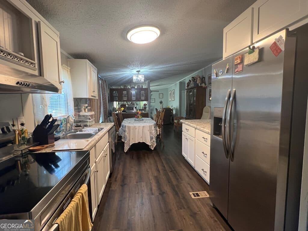 3 bedroom, 2 bathroom, 1,404 sq ft manufactured home,single family residence for sale at 166 Pebble Hills Road, Cochran, GA 31014 — photo 7