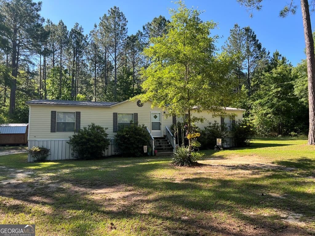 3 bedroom, 2 bathroom, 1,404 sq ft manufactured home,single family residence for sale at 166 Pebble Hills Road, Cochran, GA 31014