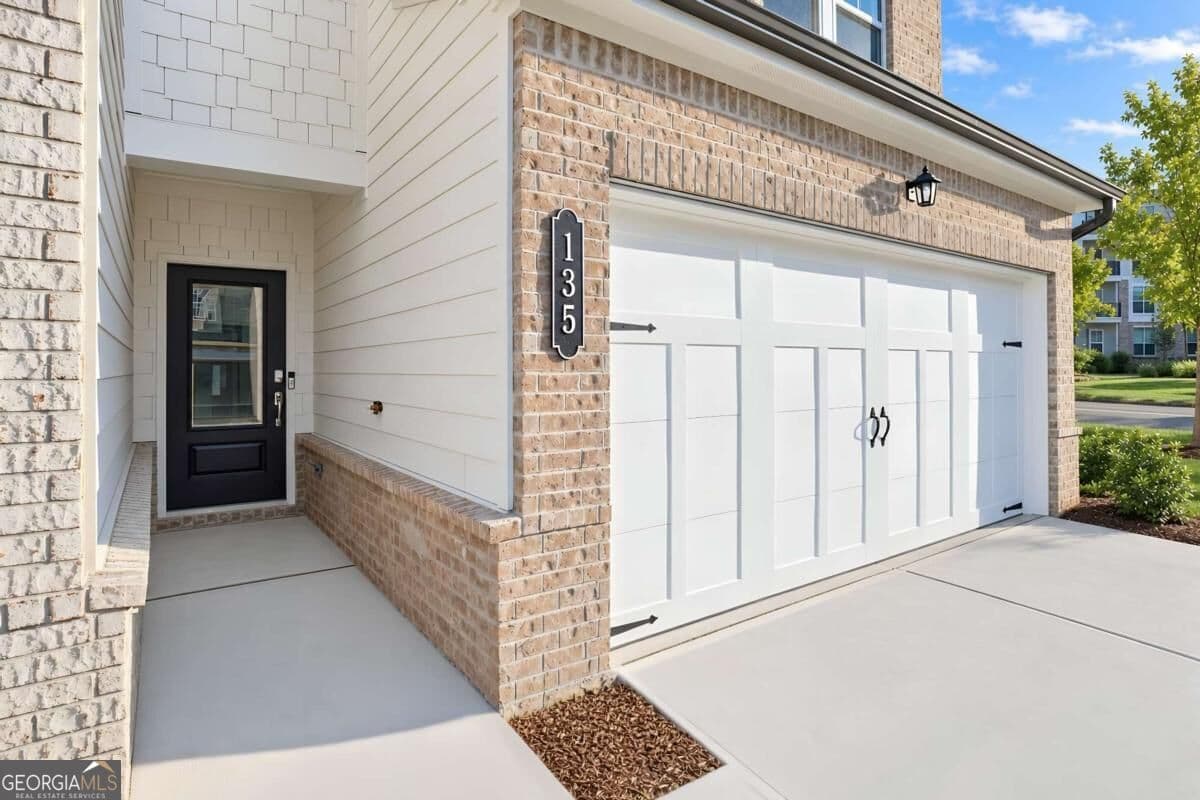 3 bedroom, 2.5 bathroom, 1,810 sq ft townhouse for sale at 135 Rope Mill Court 15, Holly Springs, GA 30115 — photo 2