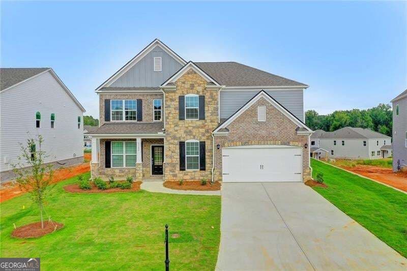 5 bedroom, 4 bathroom, 3,555 sq ft single family residence for sale at 5280 Blue Mountain Lane, Cumming, GA 30040 — photo 2