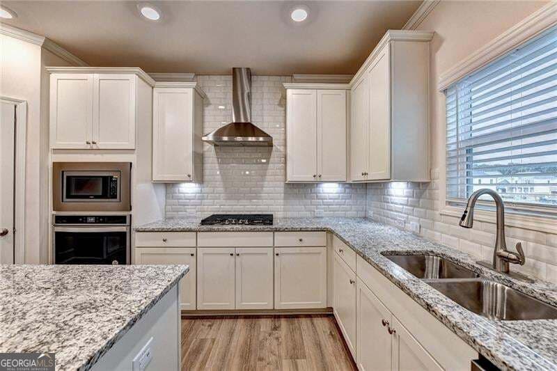 5 bedroom, 4 bathroom, 3,555 sq ft single family residence for sale at 5280 Blue Mountain Lane, Cumming, GA 30040 — photo 7