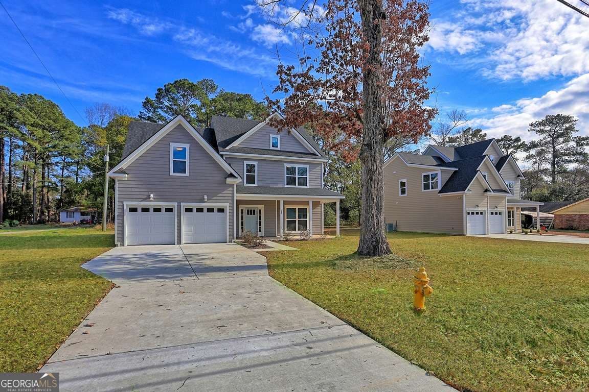 4 bedroom, 3.5 bathroom, 2,674 sq ft single family residence for sale at 222 Skinner Avenue, Pooler, GA 31322 — photo 2