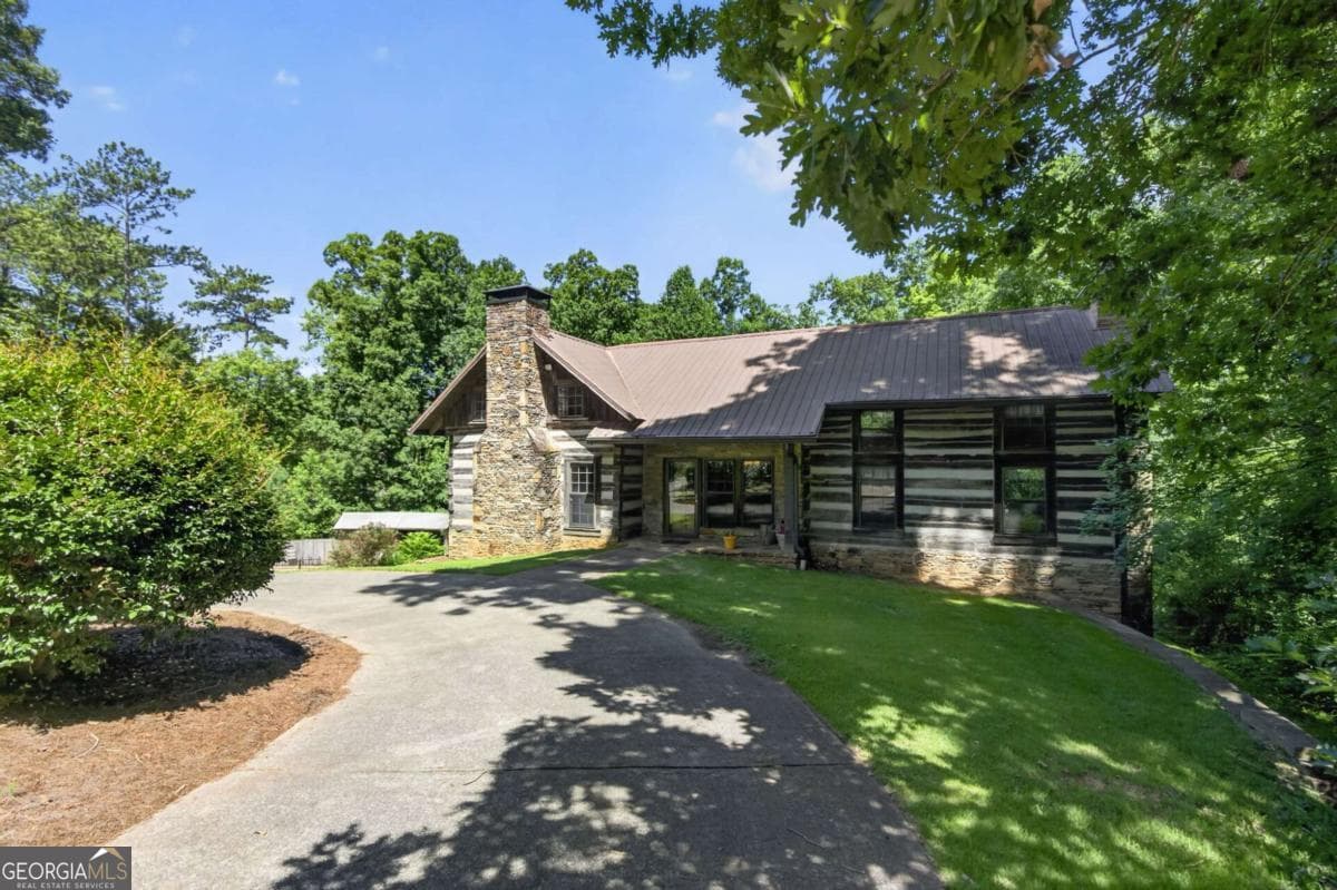 3 bedroom, 2.5 bathroom, 2,707 sq ft cabin,single family residence for sale at 331 Rockstore Road, Dallas, GA 30132 — photo 4