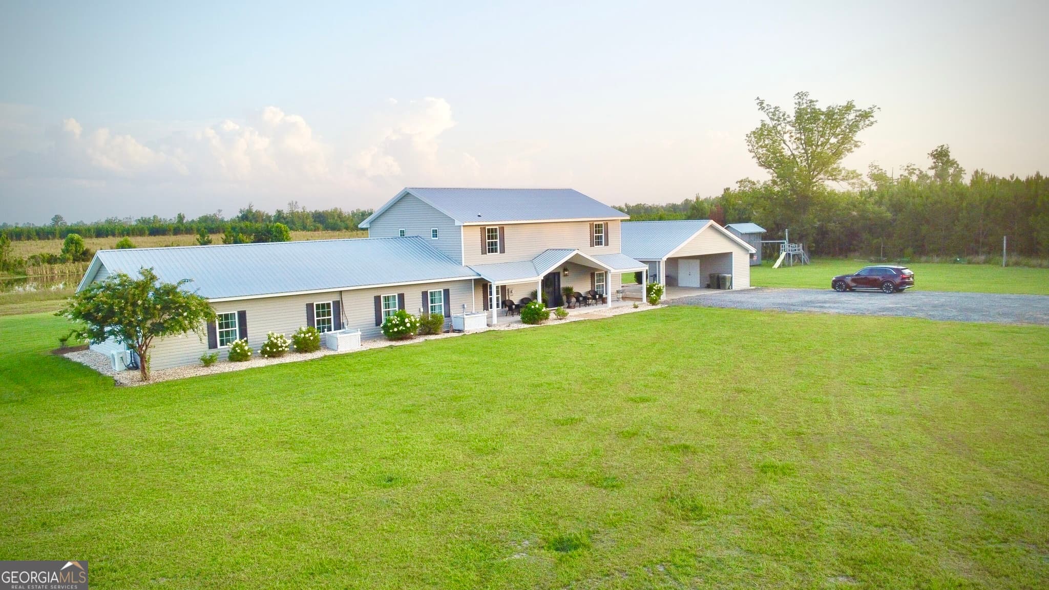 4 bedroom, 3 bathroom, 3,368 sq ft single family residence for sale at 2495 Broxton Highway, Denton, GA 31532 — photo 2