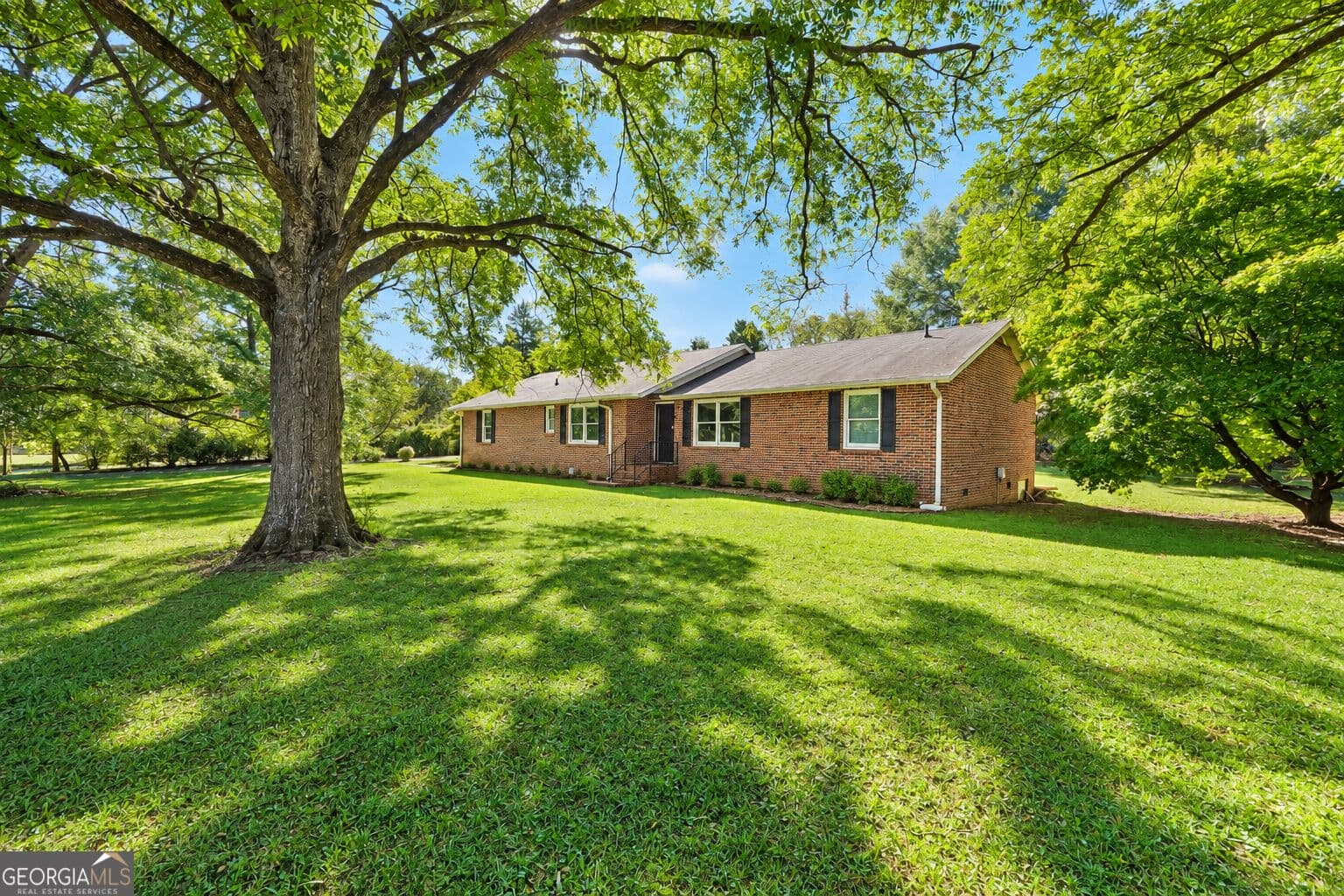 3 bedroom, 3 bathroom, 2,108 sq ft single family residence for sale at 115 Price Drive, Locust Grove, GA 30248 — photo 2