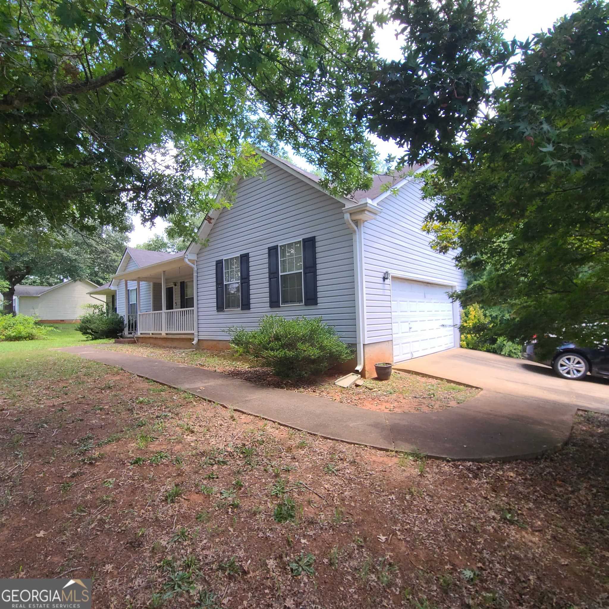 3 bedroom, 2 bathroom, 1,247 sq ft single family residence for sale at 403 Victoria Place, Locust Grove, GA 30248 — photo 2