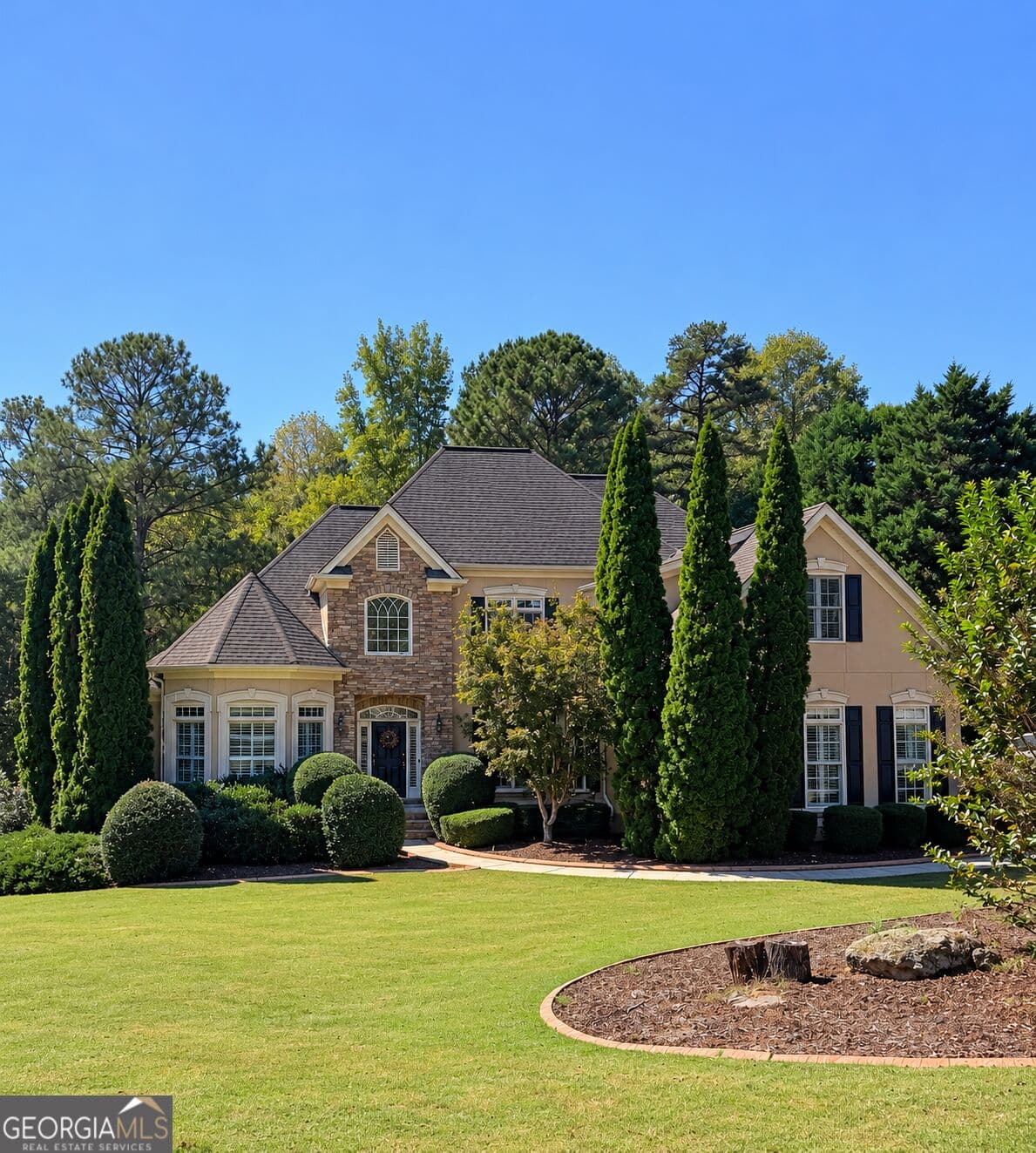 6 bedroom, 5.5 bathroom, 5,219 sq ft single family residence for sale at 348 Loring Lane, Peachtree City, GA 30269 — photo 1 of 34