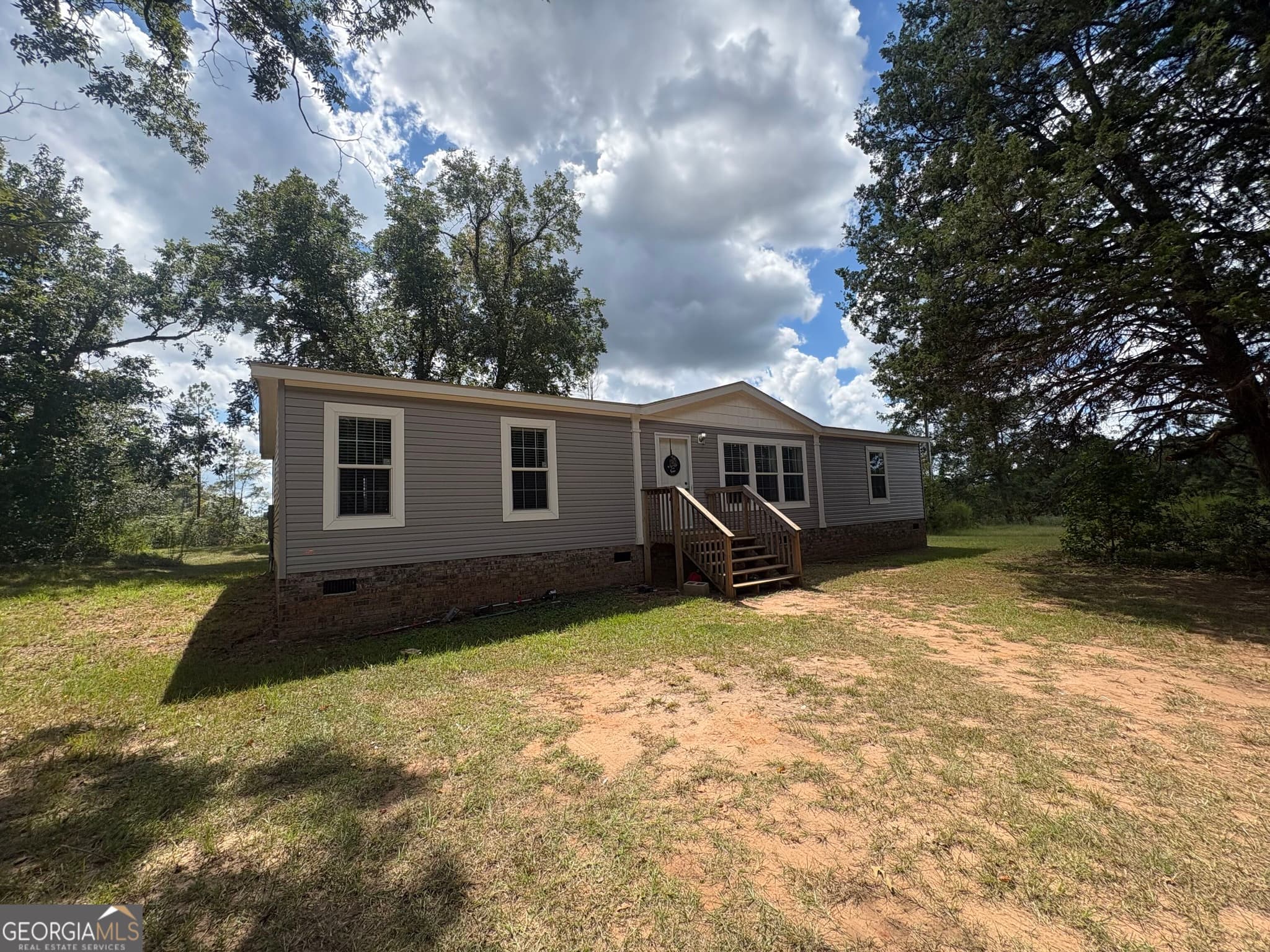 3 bedroom, 2 bathroom, 1,800 sq ft manufactured home,single family residence for sale at 590 Bussell Road, Warthen, GA 31094 — photo 2