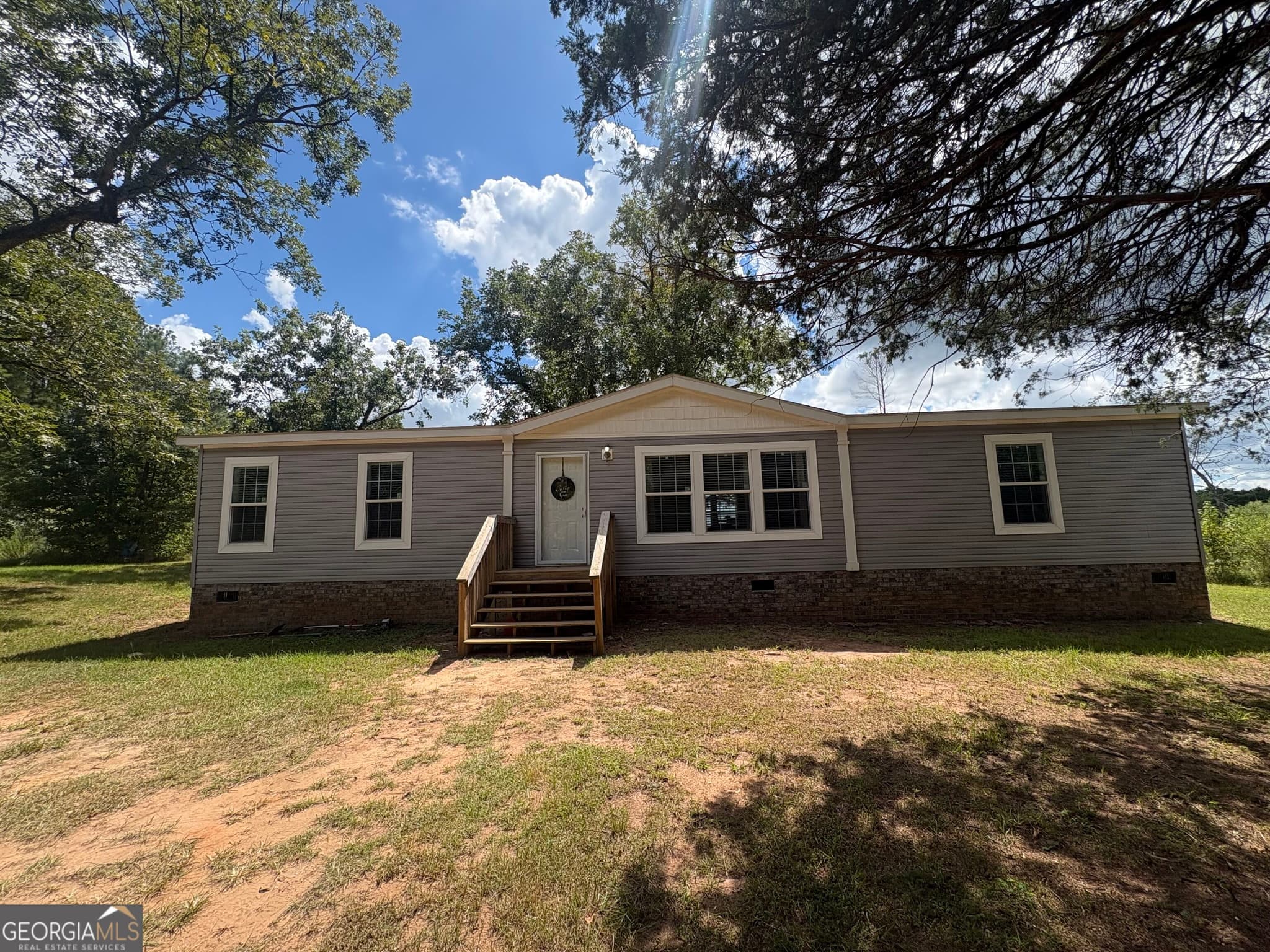 3 bedroom, 2 bathroom, 1,800 sq ft manufactured home,single family residence for sale at 590 Bussell Road, Warthen, GA 31094