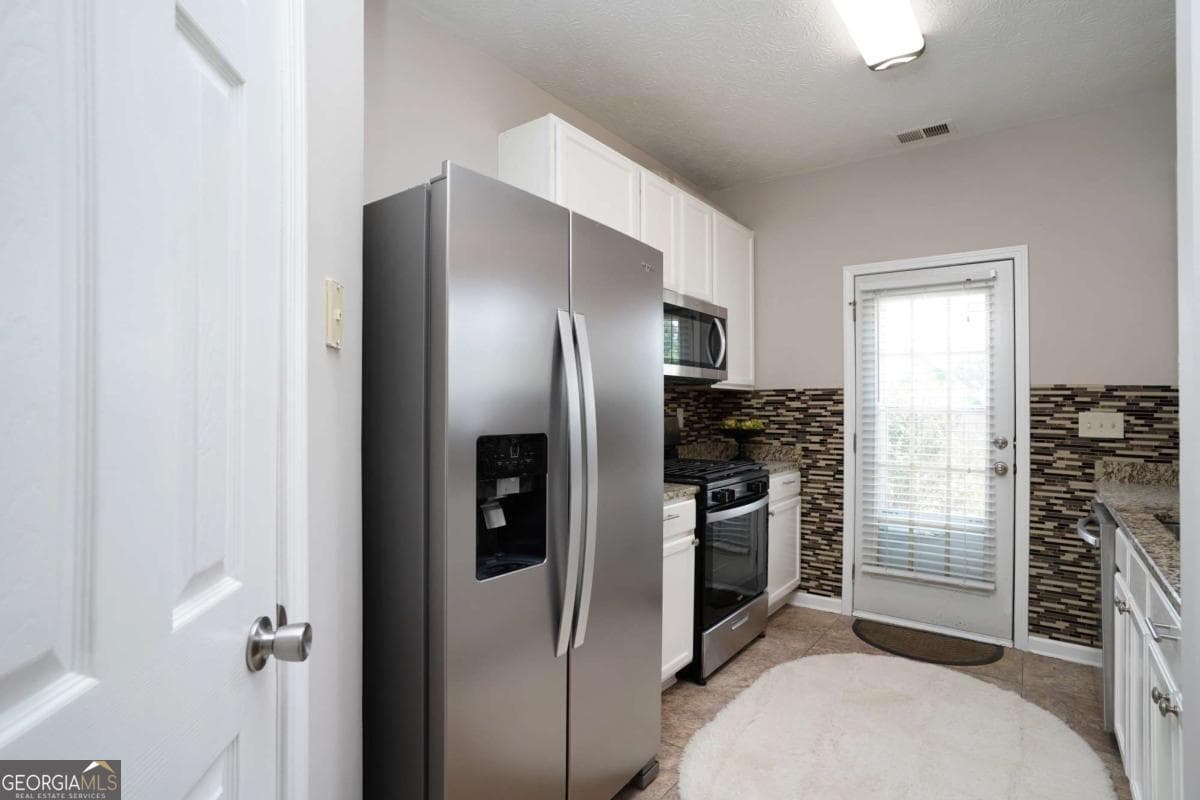 3 bedroom, 2.5 bathroom, 1,456 sq ft townhouse for sale at 182 Oak Green Drive, Lawrenceville, GA 30044 — photo 7