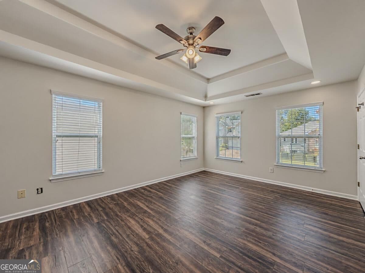 5 bedroom, 3 bathroom, 2,974 sq ft single family residence for sale at 4896 Laythan Jace Court, Snellville, GA 30039 — photo 3