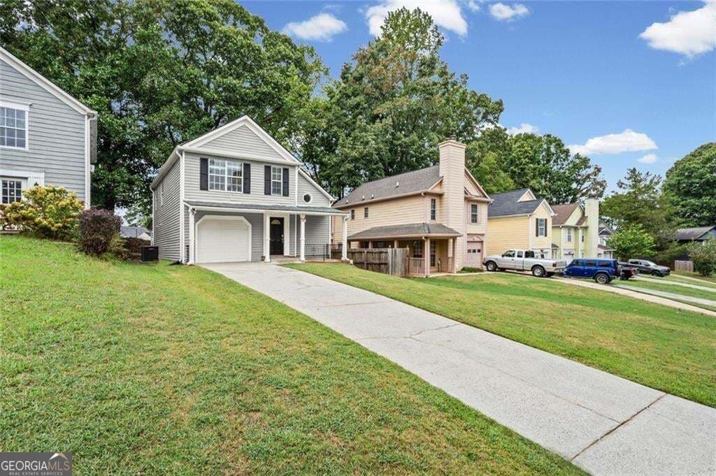 3 bedroom, 2.5 bathroom, 1,532 sq ft single family residence for sale at 1180 Holly Circle, Lawrenceville, GA 30044 — photo 3