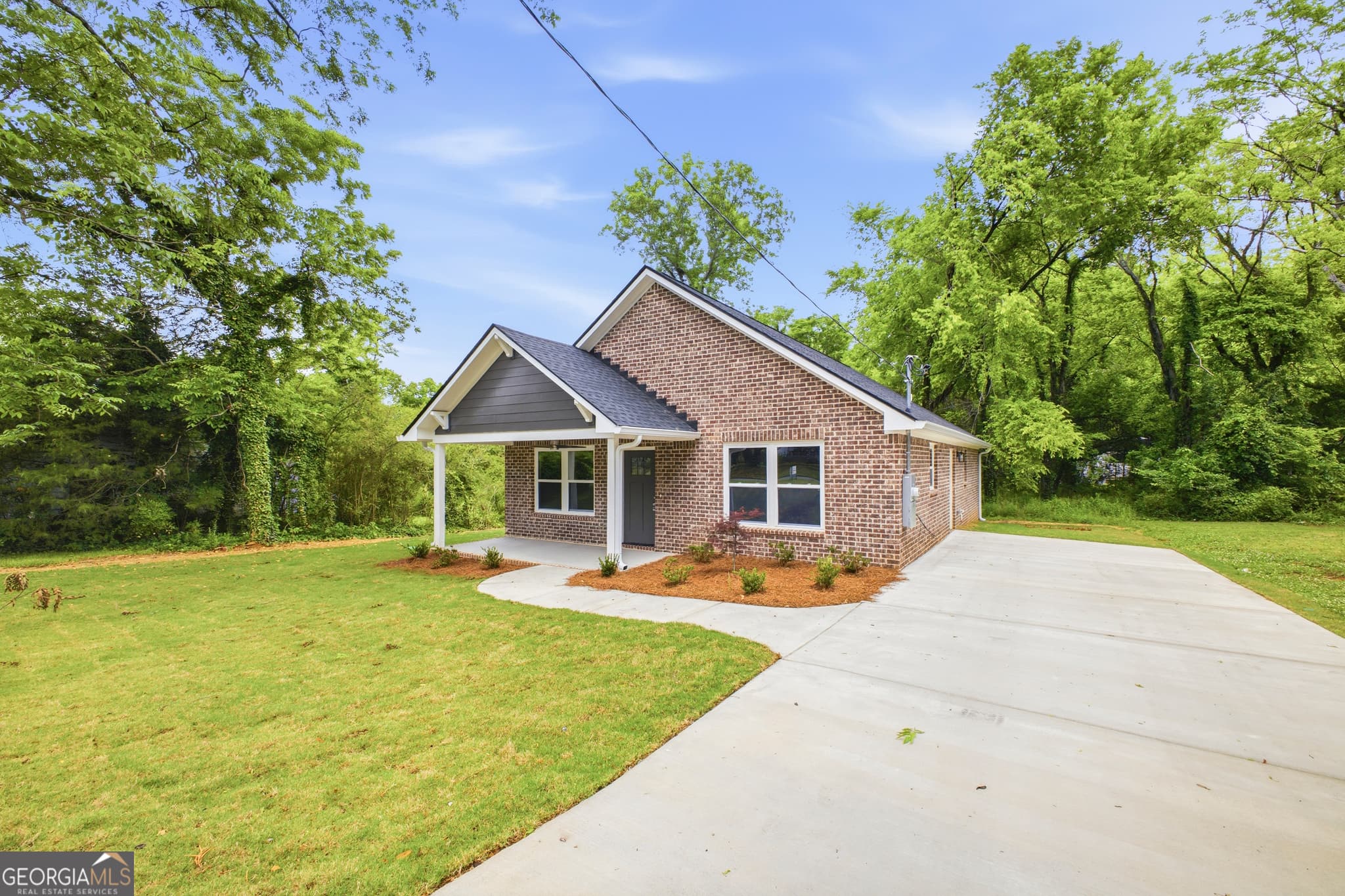 3 bedroom, 2 bathroom, 1,320 sq ft single family residence for sale at 311 E 17th Street, Rome, GA 30161 — photo 2