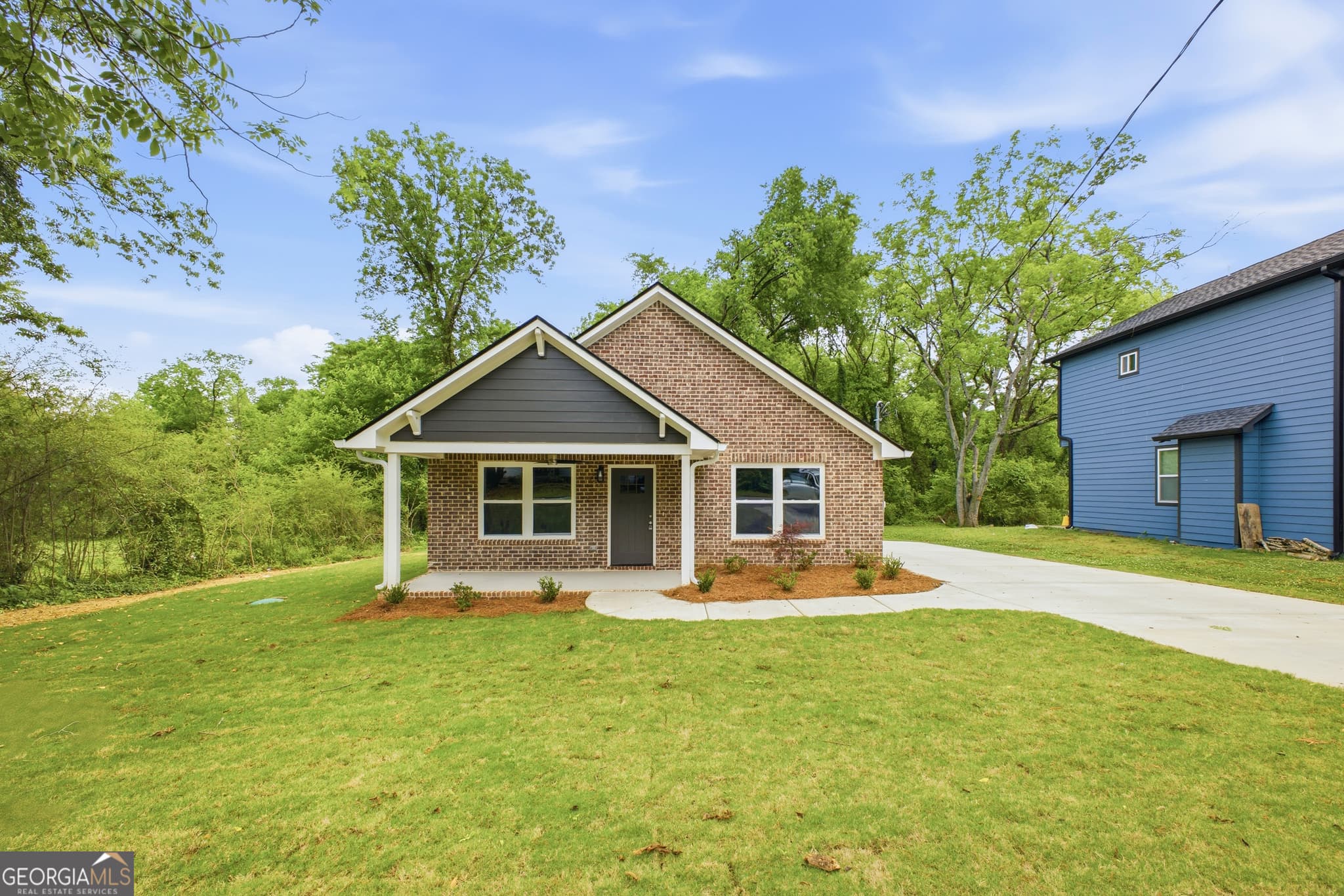 3 bedroom, 2 bathroom, 1,320 sq ft single family residence for sale at 311 E 17th Street, Rome, GA 30161 — photo 3