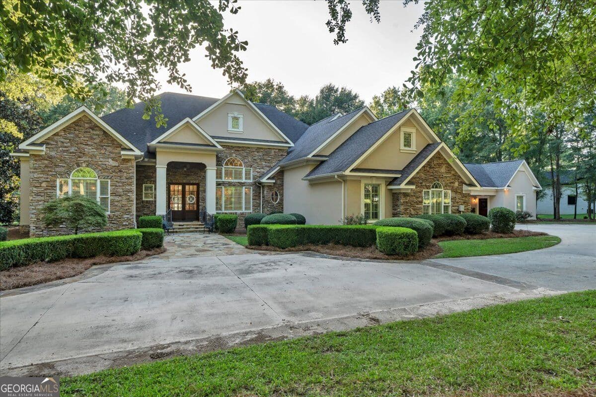 7 bedroom, 5 bathroom, 5,999 sq ft single family residence for sale at 205 Walton Chase, Perry, GA 31069 — photo 2