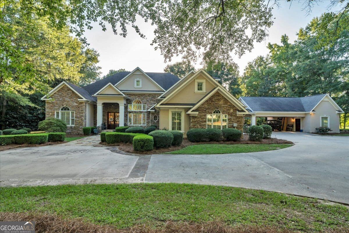 7 bedroom, 5 bathroom, 5,999 sq ft single family residence for sale at 205 Walton Chase, Perry, GA 31069 — photo 1 of 82