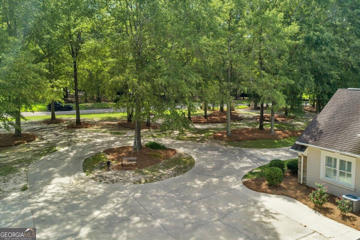 7 bedroom, 5 bathroom, 5,999 sq ft single family residence for sale at 205 Walton Chase, Perry, GA 31069 — photo 8